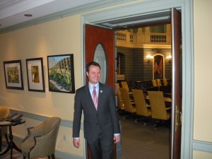 Senator Eric Lesser exit the Senate chamber (WMassP&I)